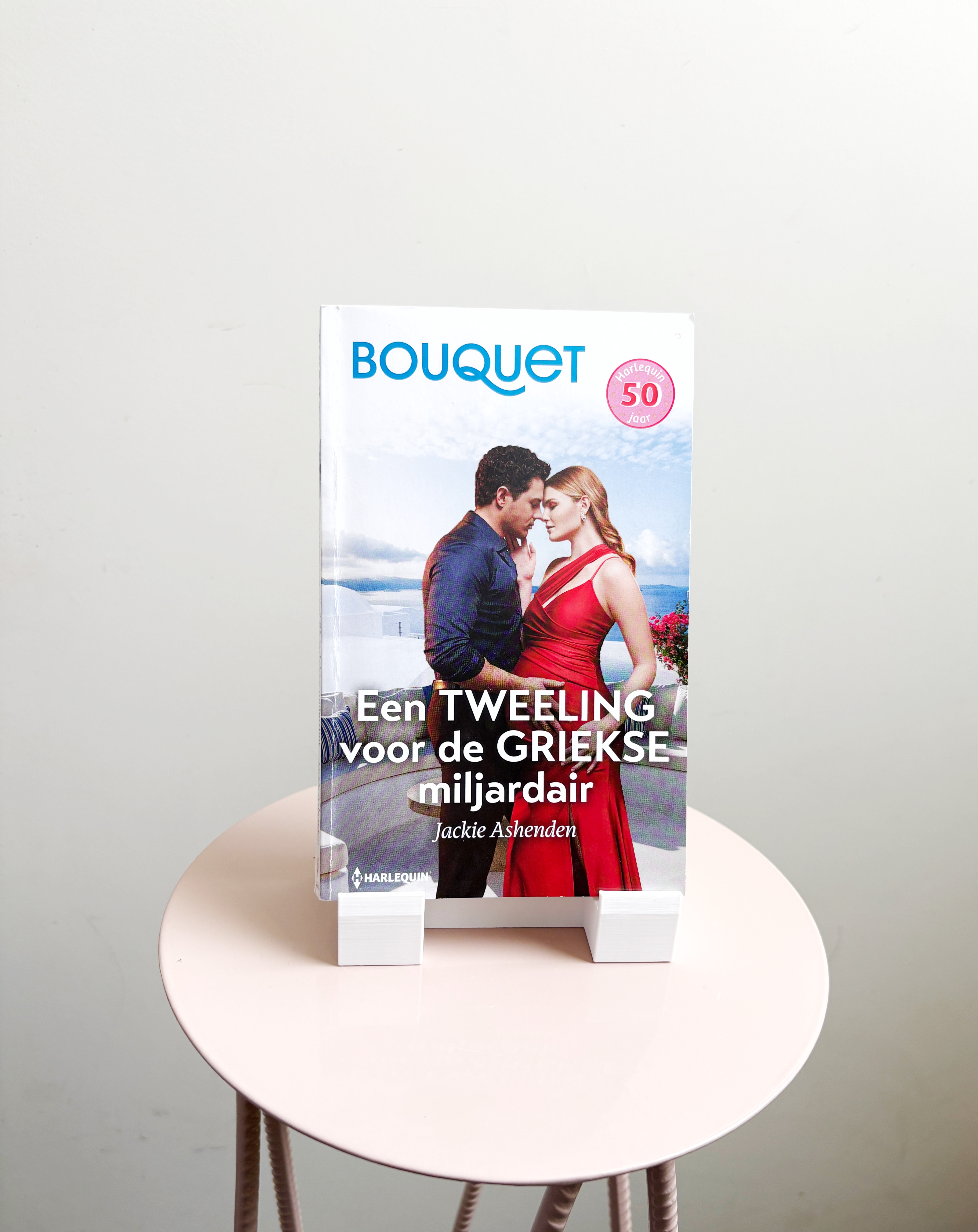 Omslag van Een tweeling voor de Griekse miljardair
